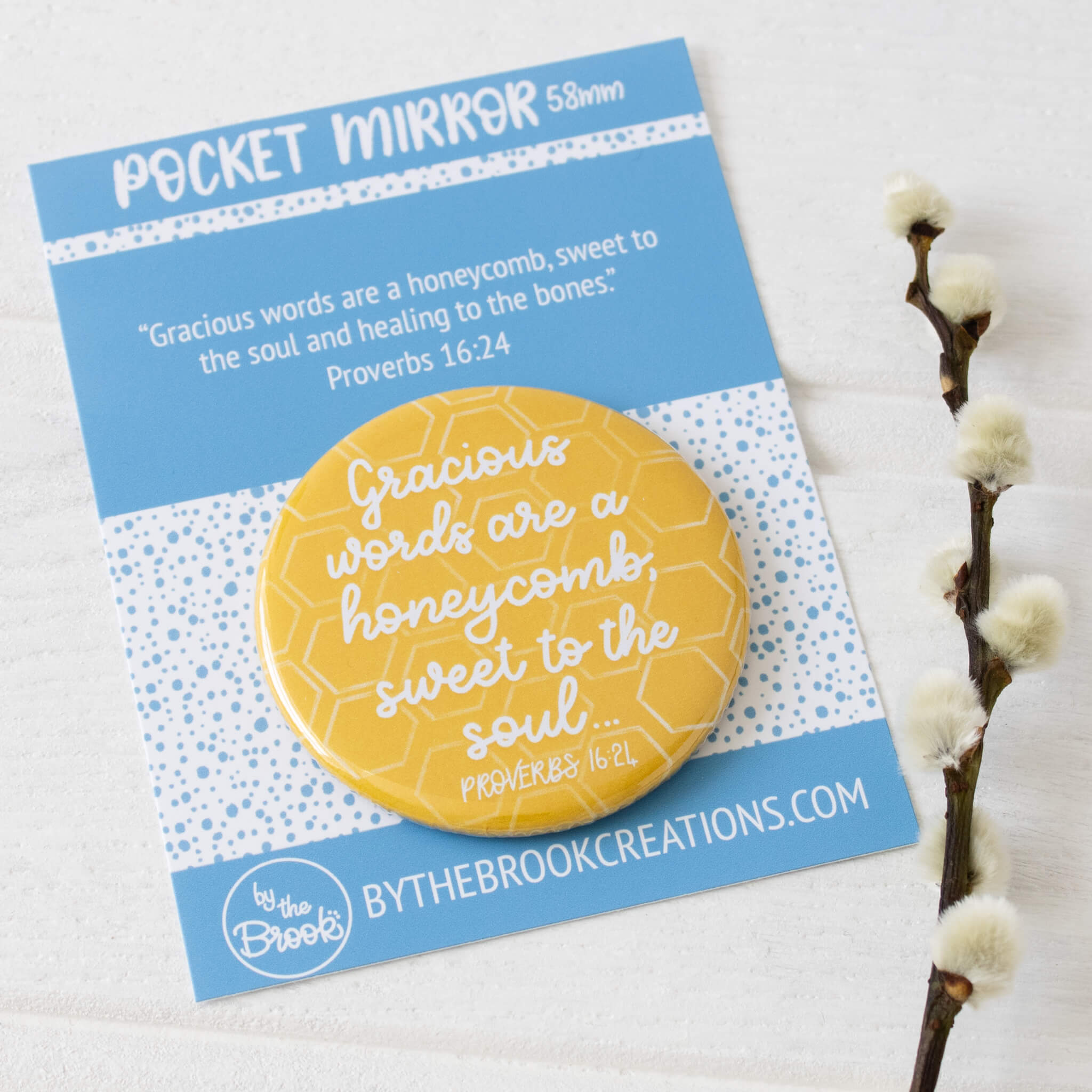 Gracious Words are a Honeycomb Pocket Mirror with bright blue packaging insert
