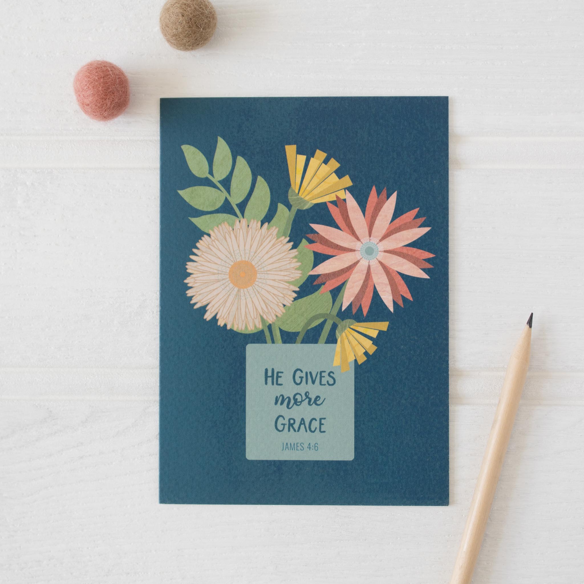 He Gives More Grace Textured Card with blue background