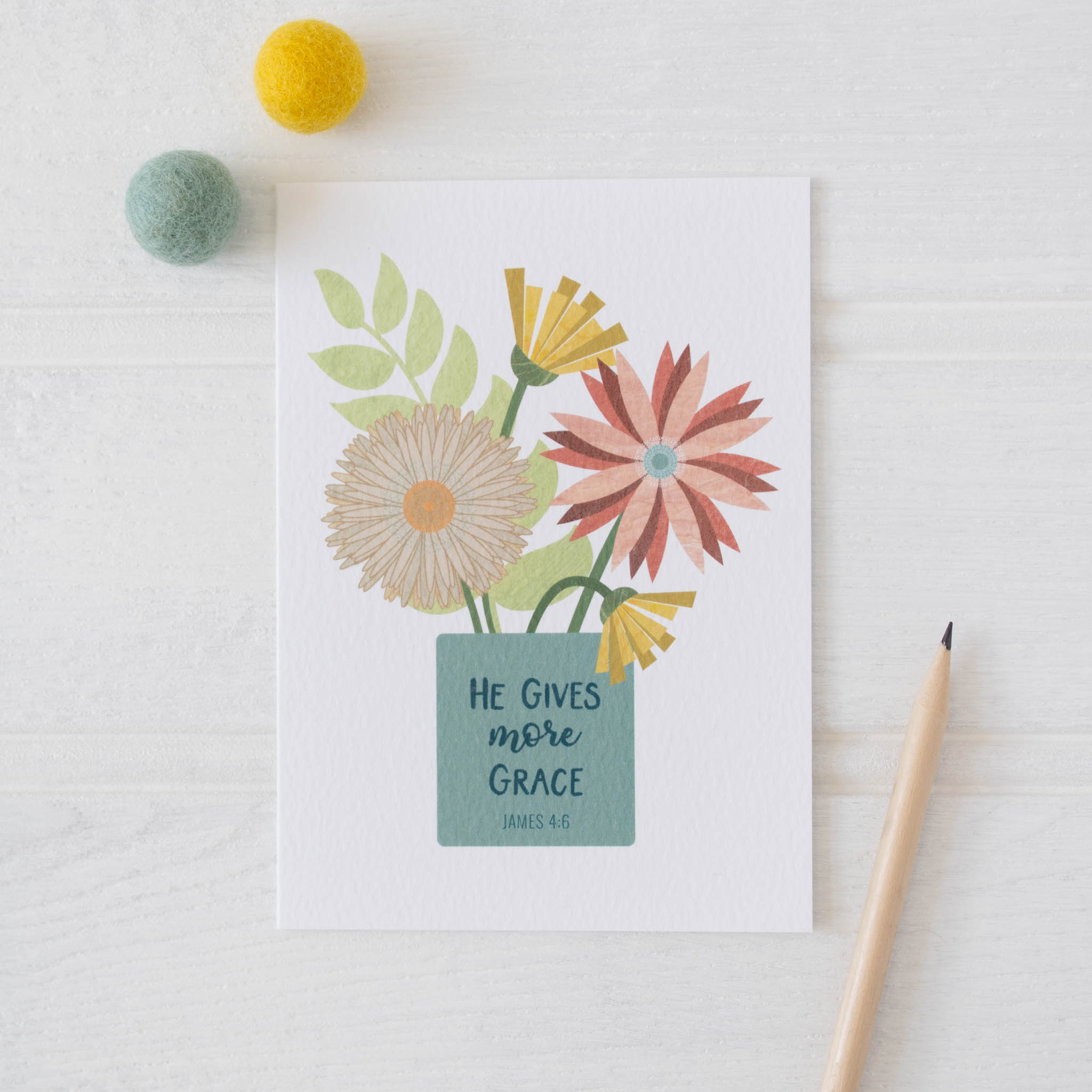 He Gives More Grace Card with white background